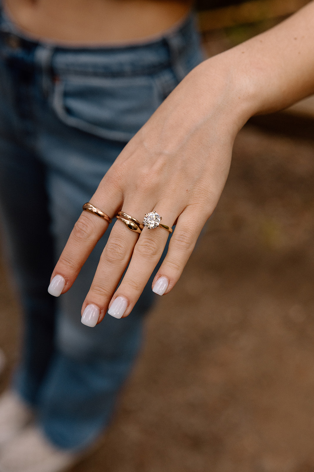 A close-up of Aidan's engagement ring