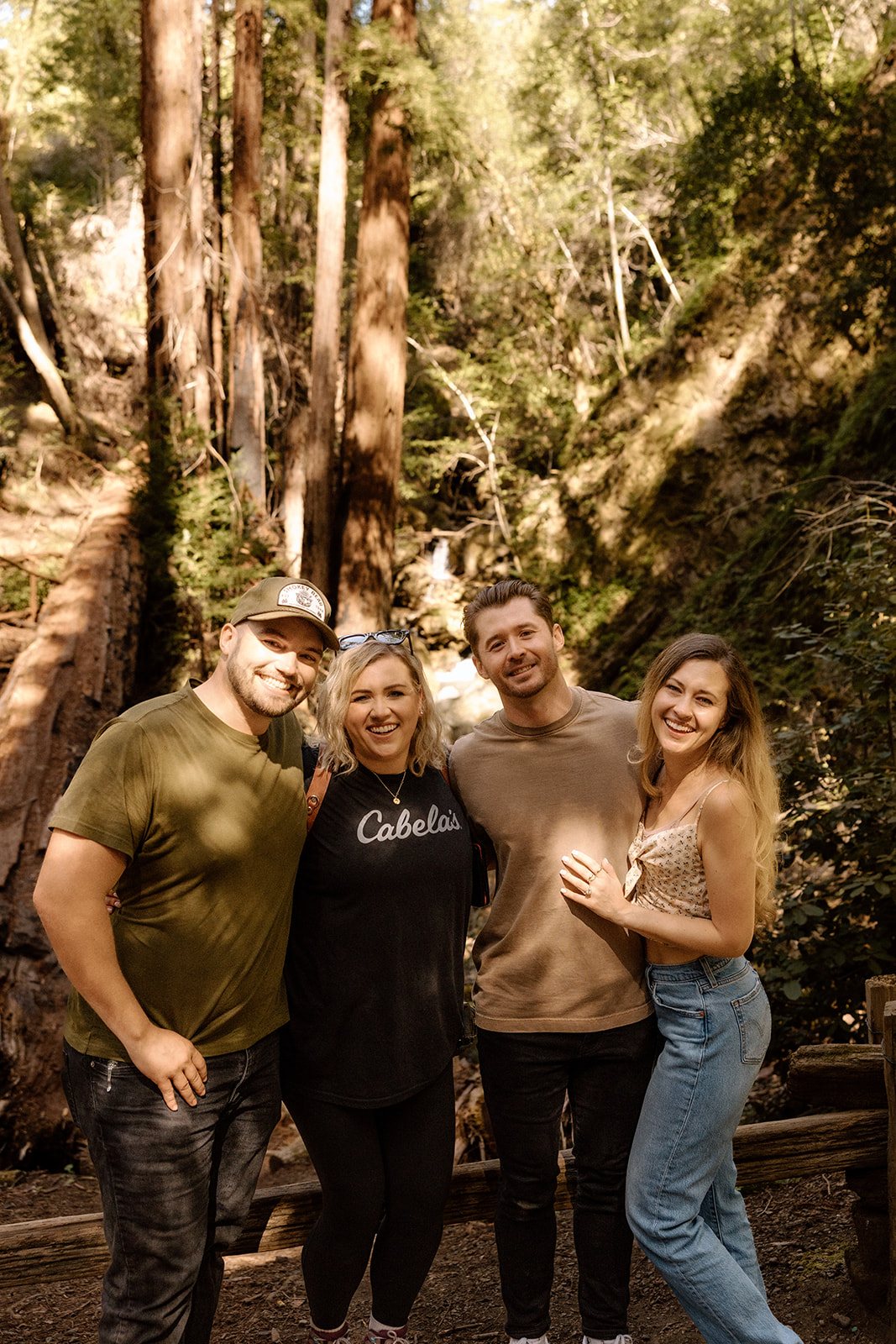 Sarah, Trevor, Abel and Aidan together in the redwoods after the proposal